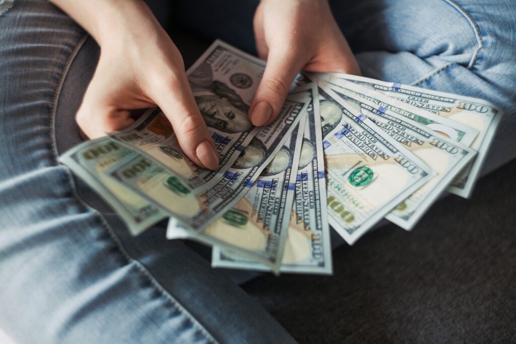 Money in hand-- treat each dollar you spend on your brand and start up like its coming out of your own wallet.